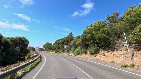 a 35-second video capturing a drive along the picturesque great ocean road in australia, showcasing winding roads and lush greenery