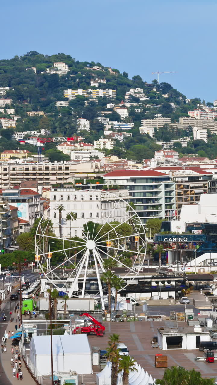 Aerial view of the harbour on the coast of Cannes, France on a cloudy day. Vertical