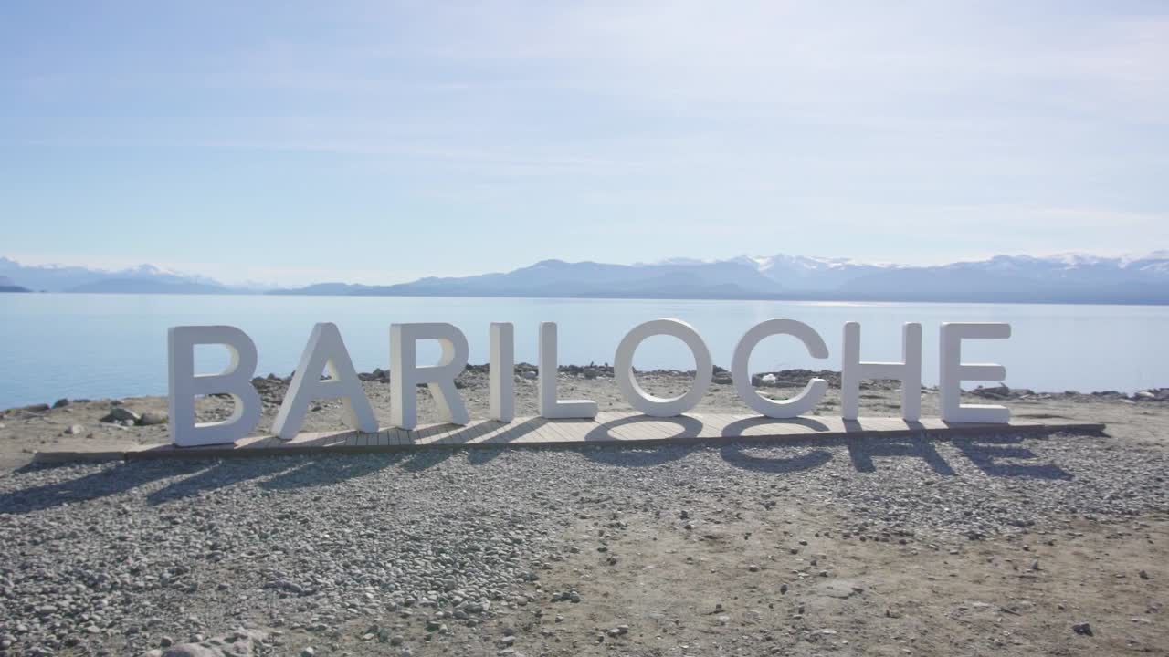 Letters of Bariloche with the lake behind on a beautiful sunny day, Bariloche, Argentina