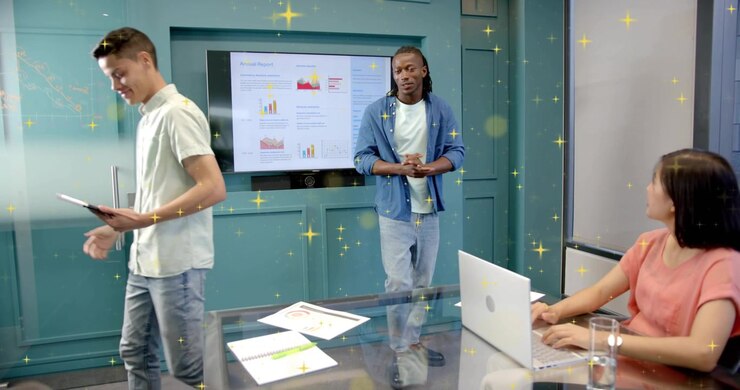 Business handshake passing tablet, junior reviewing tablet exiting as presenter explaining charts