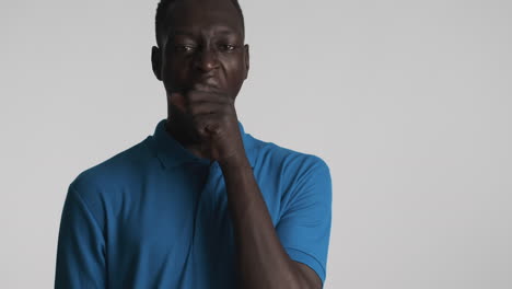 Tired-african-american-man-on-grey-background.