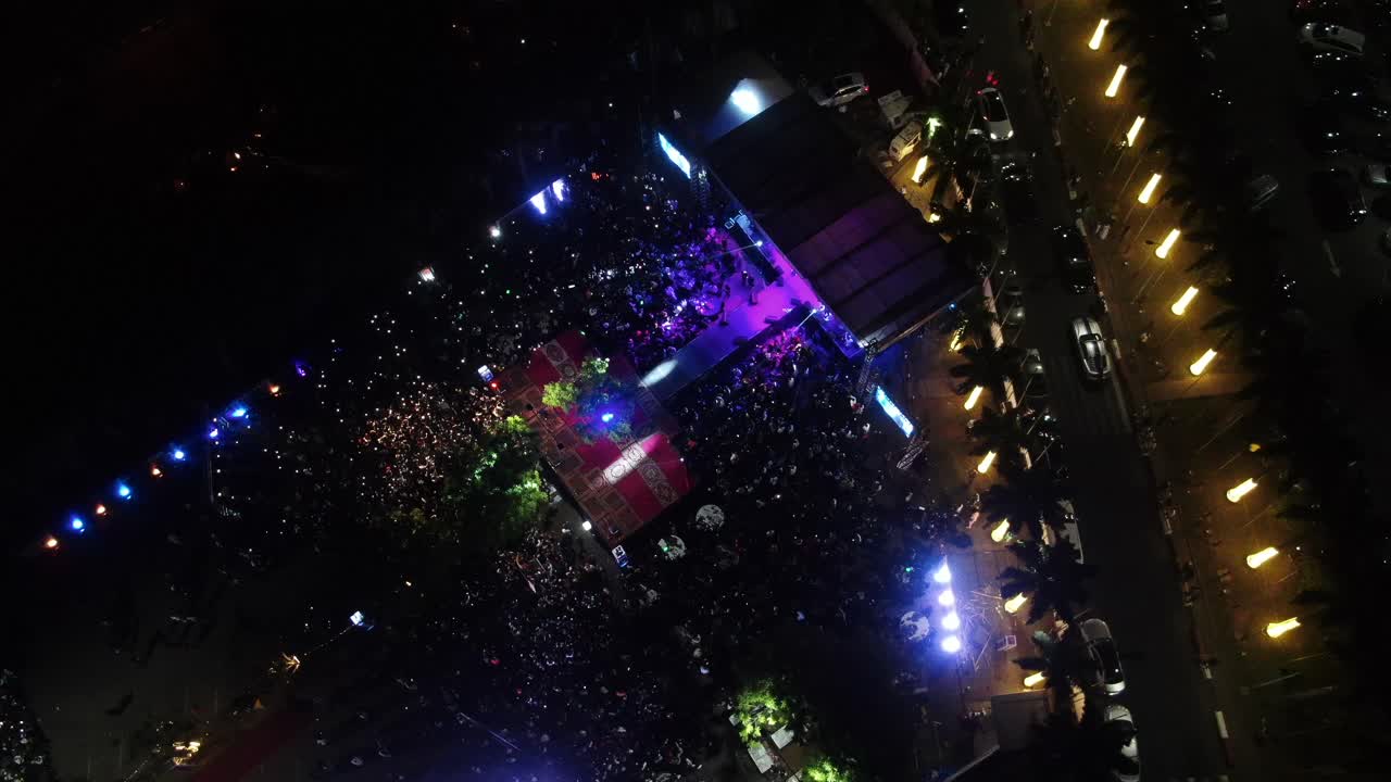 Aerial View of a Night Concert with a Large Crowd