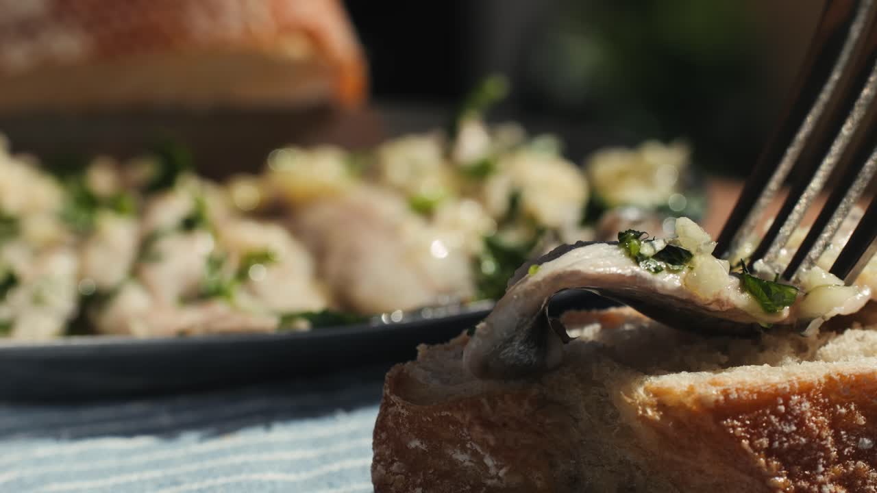 Fresh Sea sardines and Anchovy Fish and Mullus On Display On Ice On Market Store Shop. Seafood Fish Background, close up stand of small salty white fish.