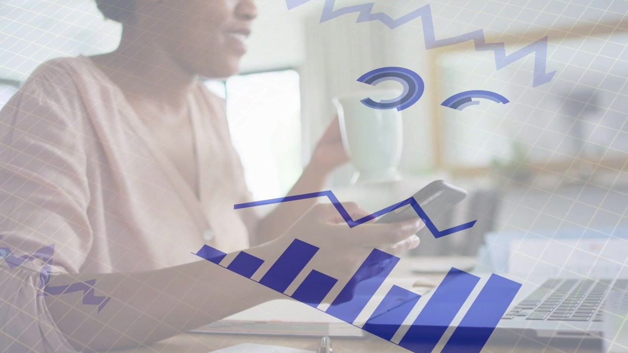 Mid-adult woman tapping phone at desk, building blue chart overlays and reviewing business data