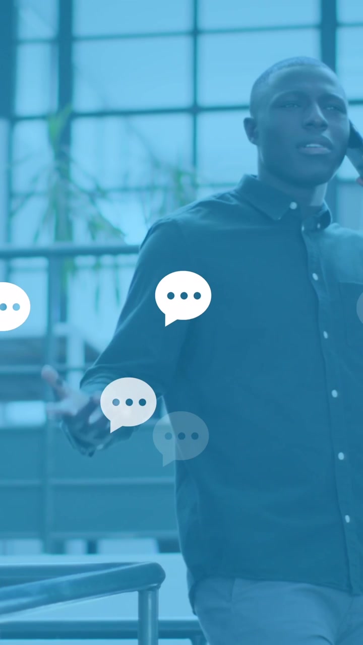 Animazione di reazioni sui social media su un uomo afroamericano in ufficio che telefona.