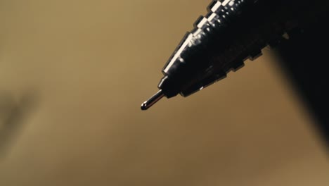 close up of a ballpoint pen being clicked repeatedly