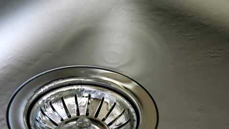kitchen sink with water drop dripping