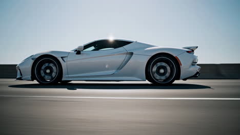 white sports car on highway