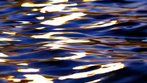 rippled water with golden sunlight reflections