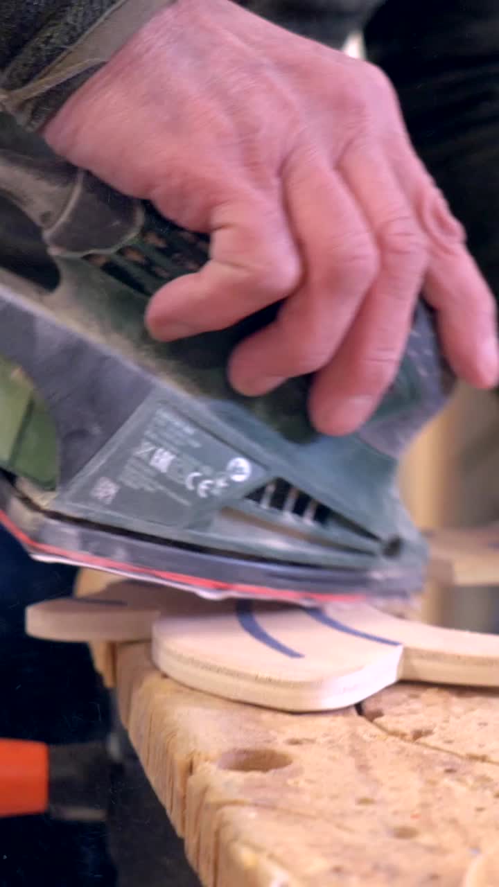 Sanding wood with a power sander