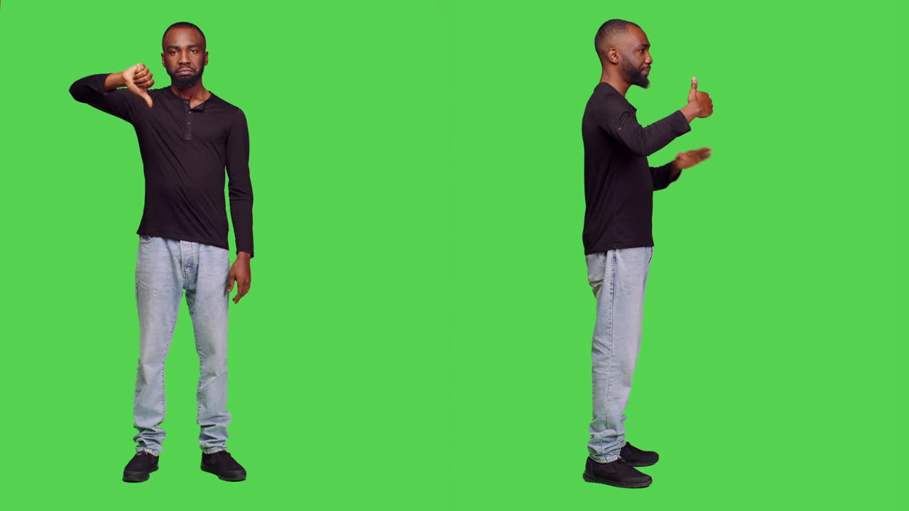 Man giving thumbs up and thumbs down on green screen
