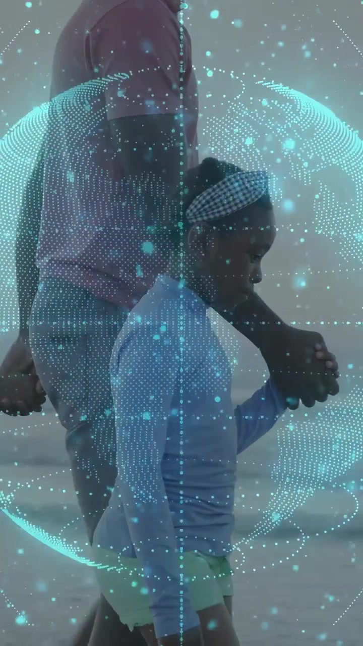 Vertical video: Dad guiding kid walking shore, globe floating over pair, turning with dots for tech