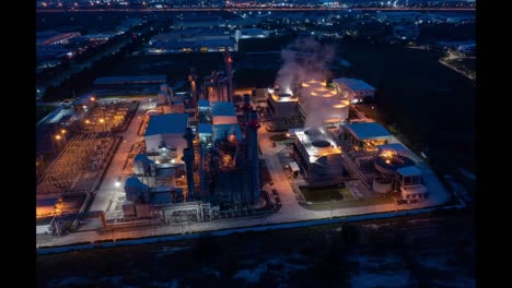 aerial hyperlapse timelapse of powerplant or fuel gas powerplant at night