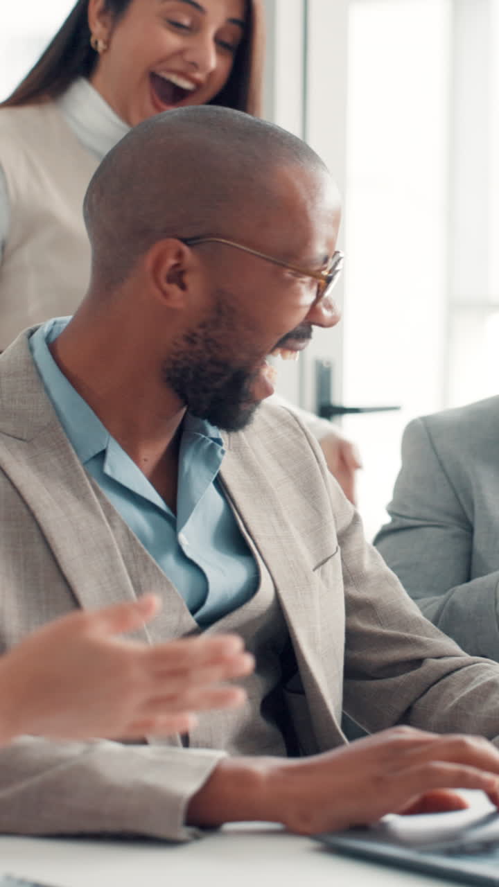 Team celebrates successful collaboration in office