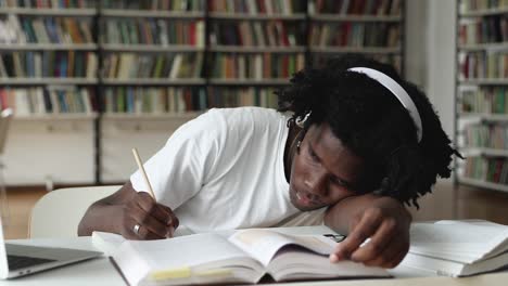 african student feels unmotivated, bored to learning, prepare for exams