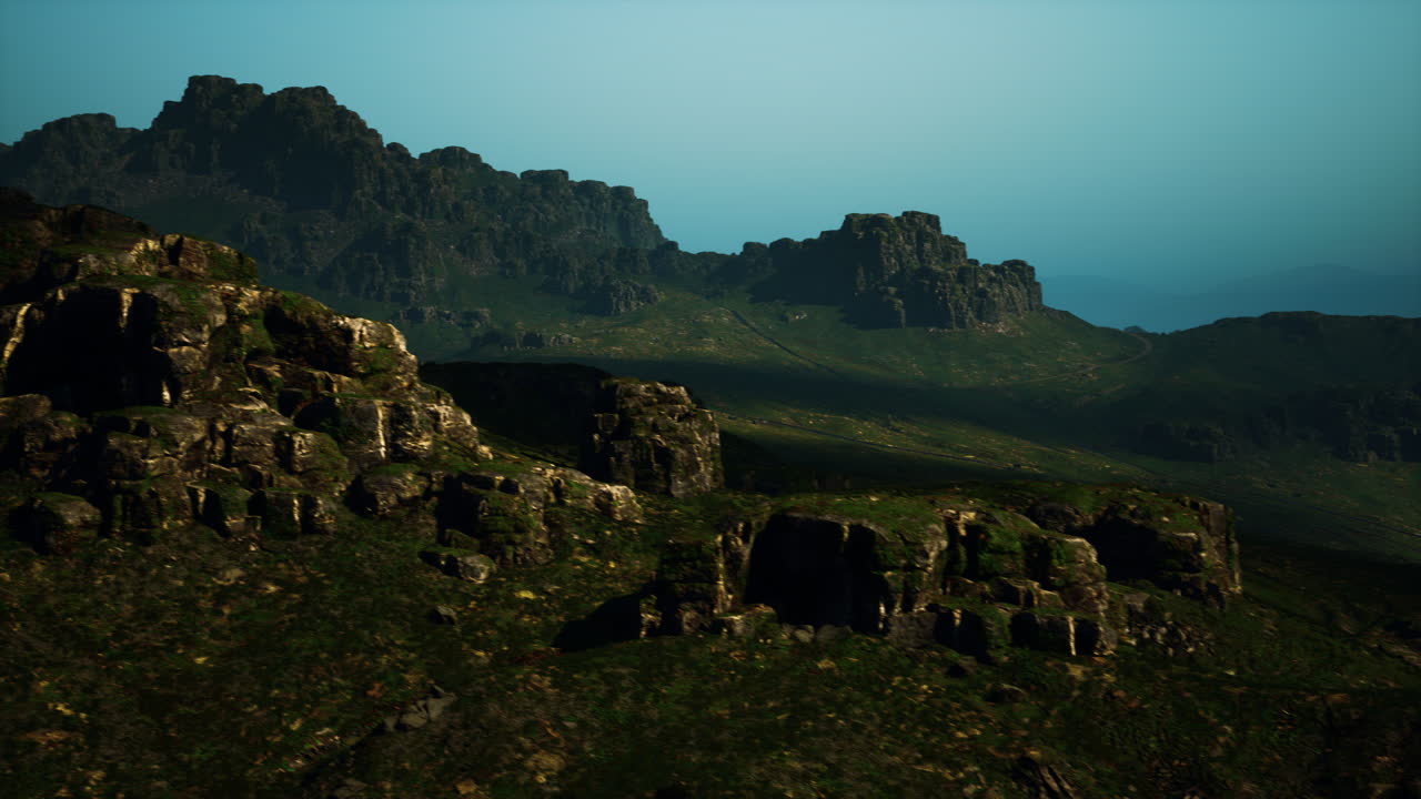 푸른 하늘 아래의 초록색 산맥