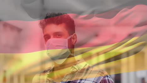 animation of flag of germany over man wearing face mask