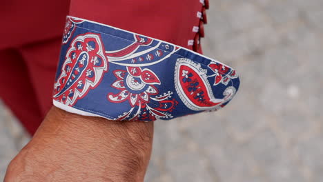 paisley pattern on shirt cuff. close up