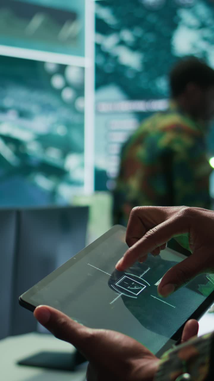 Vertical Video Military officer leads cybersecurity operations in a high tech operation room