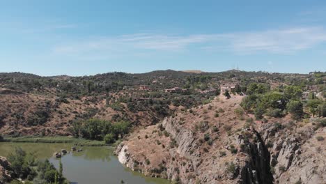 tagus river, the longest river in the iberian peninsula, in its course through toledo, spain