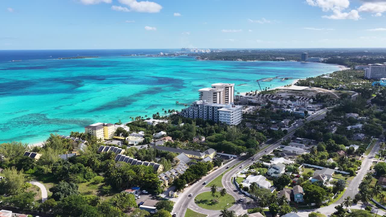 Cable Beach At Nassau In New Providence Bahamas. Beach Landscape. Bay Harbor Scenery. Downtown District. Cable Beach In Nassau In New Providence Bahamas. Amazing Caribbean Sea