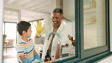 Happy-father,-high-five-or-child-washing-dishes