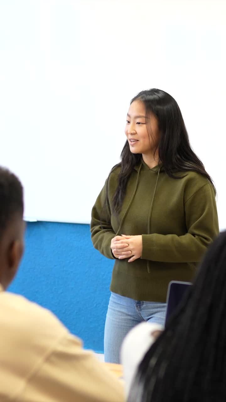 Woman Giving Presentation in Classroom