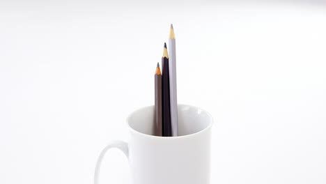 colored pencils kept in mug