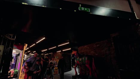 people enjoying a vibrant arcade atmosphere