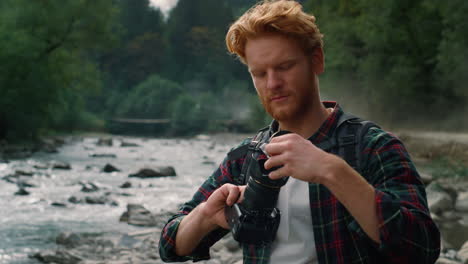 hiker taking pictures in nature landscape