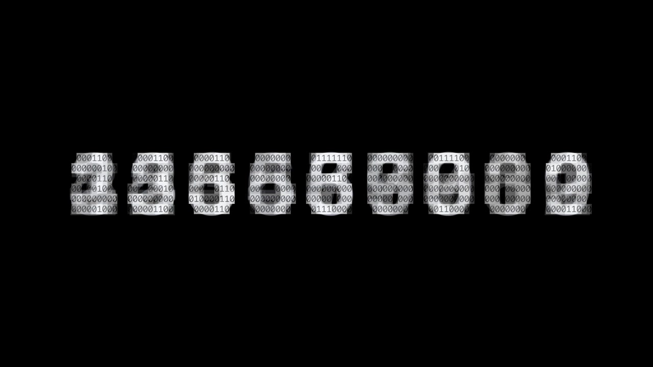 Numeri glitchati in rapido movimento, che si distorcono su uno sfondo nero.