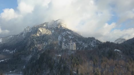 castle drachenfels against white clouds in the winter, siebengebirge, germany