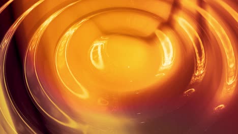 fondo abstracto en bucle con patrón líquido dorado brillante y ondulado en una superficie brillante y brillante. fluido amarillo viscoso. hermoso telón de fondo festivo creativo.