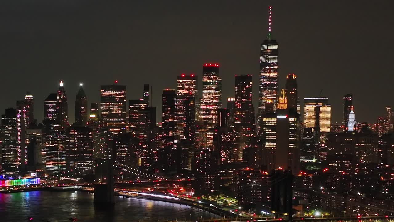 Stunning aerial view of New York City skyline illuminated at night ...