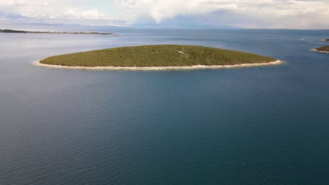 Uninhabited-islet-and-calm-sea-waters