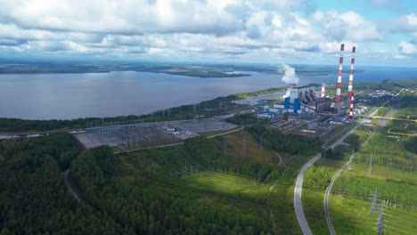 aerial view of a power plant and surrounding landscape