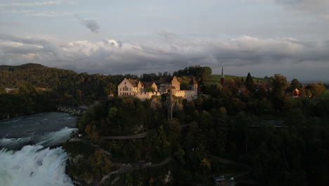 fantastic aerial shot in orbit and in the middle distance to the falls of the rhine and where the castle of laufen can be seen