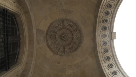 ornate stone ceiling in an architectural archway