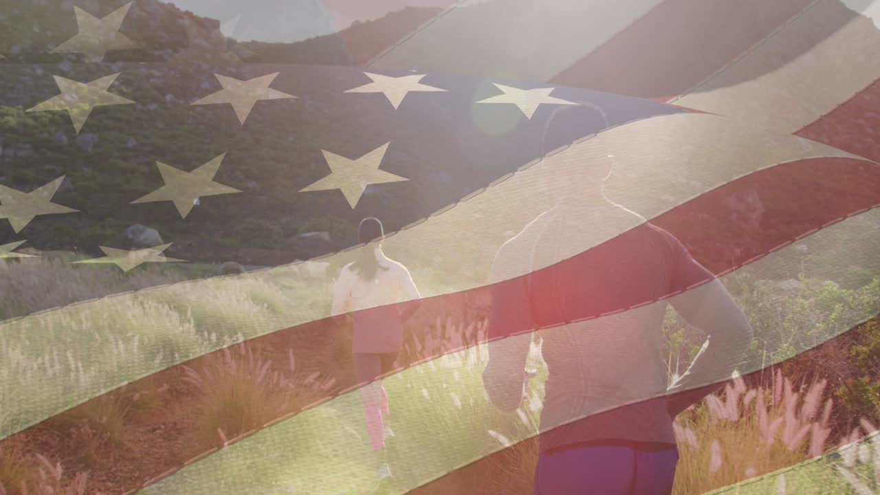 미국  ⁇ 발의 애니메이션이 초원에서 달리는 커플을 가로질러 움직입니다.