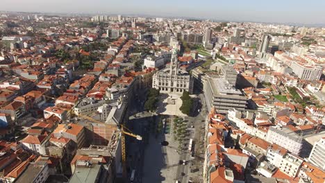 aerial drone footage - the porto city hall is perched atop the avenida dos aliados, or the avenue of the allies in porto, portugal