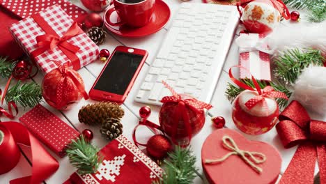 Christmas-symbols-around-devices-and-hot-beverage