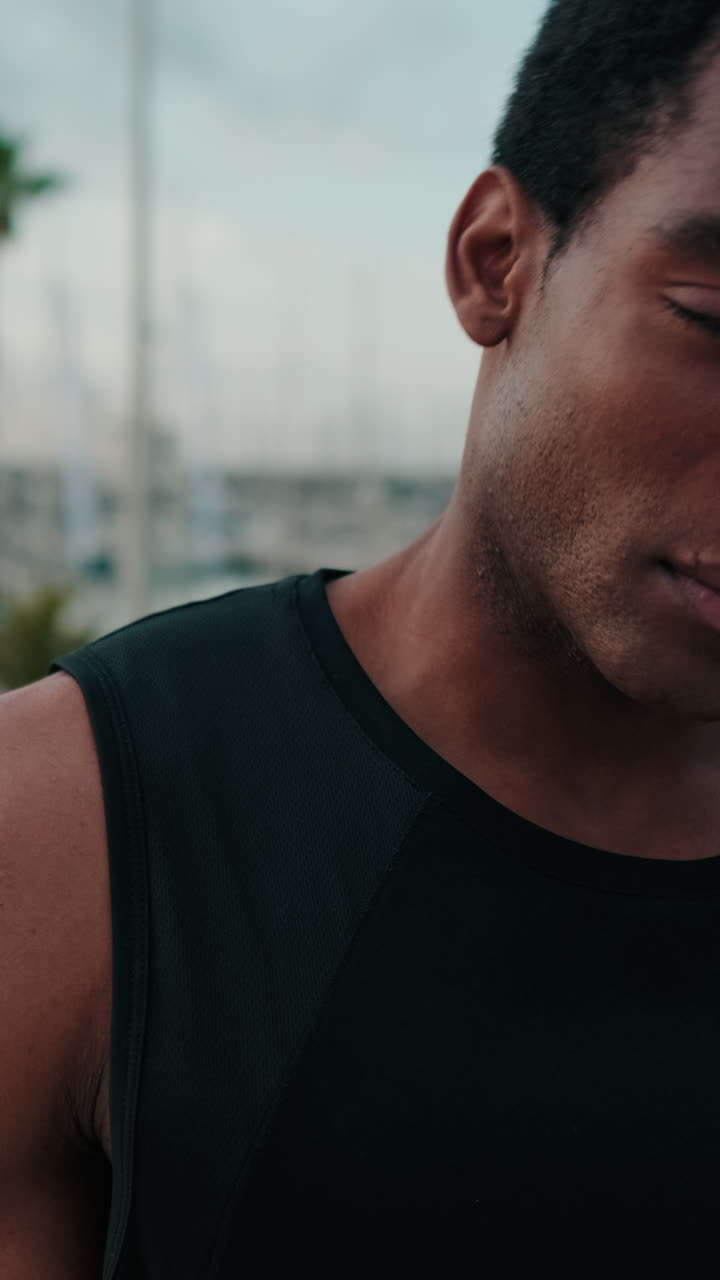 Athlete Stretching Neck After Workout by Marina