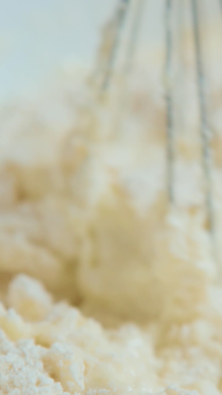 A Close-up View of Mixing Ingredients with a Whisk Enhanced in Textures and Colors, Capturing the Essence of Culinary Creativity and Food Preparation