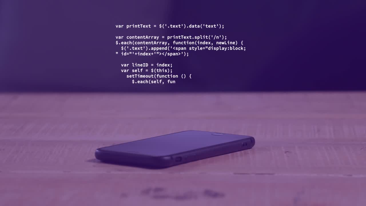 Animation of computer language over cellphone on wooden table in background