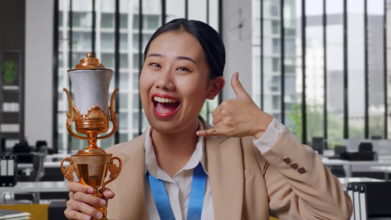 Successful Business Woman Celebrating Achievement