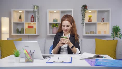 Home-office-worker-woman-happy-and-cheerful.