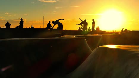 skateboarding at sunset skatepark