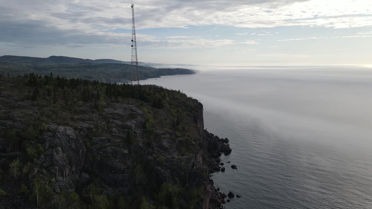 Aerial footage of palisade head on a foggy summer morning