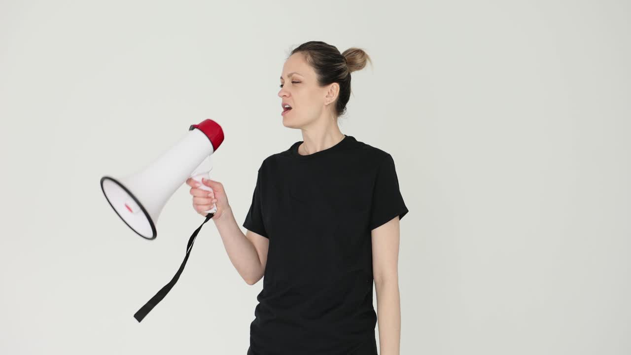 Woman speaking through megaphone