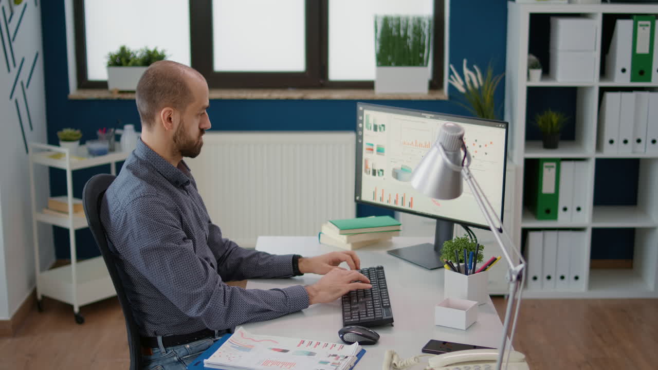 Research analyst planning strategy with business charts